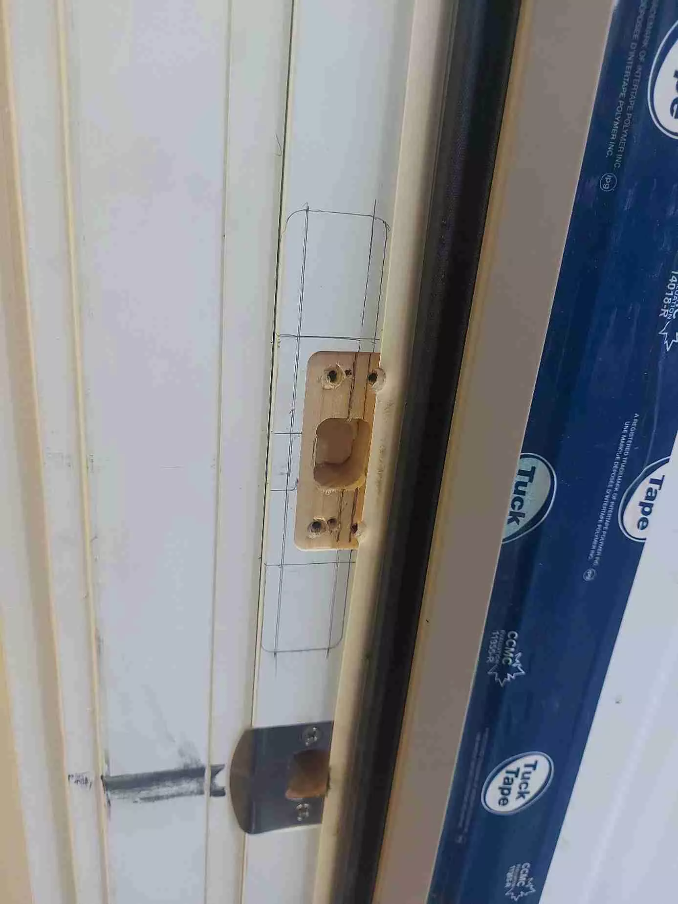 Door before the electric strike installation
